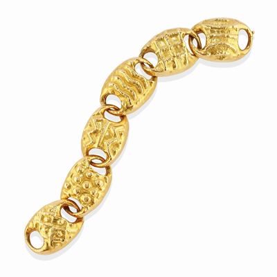 Bracciale in oro giallo 18k con decori stilizzati