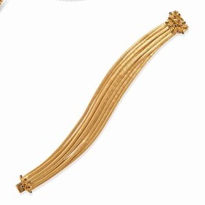 A 18k yellow gold and sapphire bracelet, circa 1960
