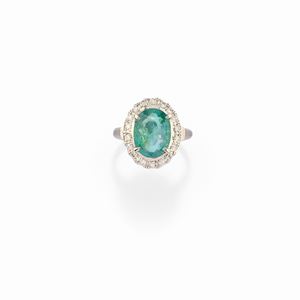 A platinum, Paraiba tourmaline and diamond ring, with certificate