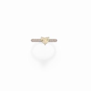 A 14k white gold and fancy diamond ring, with certificate