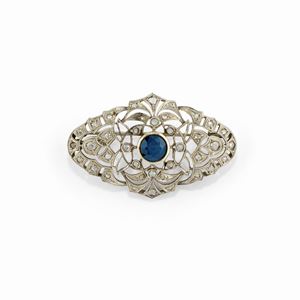 A 18k white gold, sapphire amd diamond pendant-brooch, circa 1930