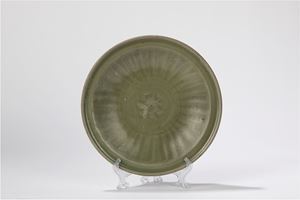 A celadon plate. China, late Yuan dynasty/ early Ming dynasty