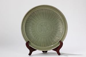 A celadon plate. China, late Yuan dynasty/ early Ming dynasty