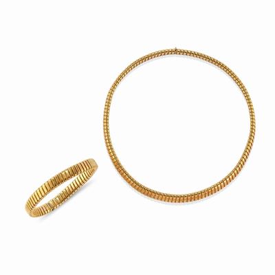 Demi Parure, in oro giallo 18k, composto da bracciale e collana