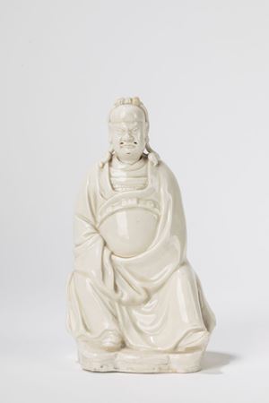A Blanc de Chine seated figure. China, 19th c.