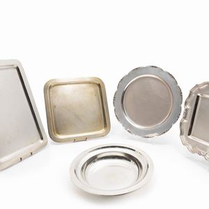 Three silver plates and two tray, Italy XX Century