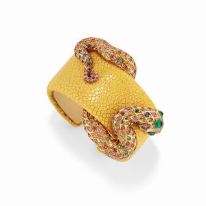 A 18k red gold, galuchat and colored gemstone bangle