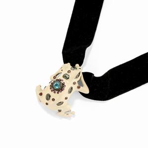 A burnished silver, enamel and colored gemstone pendant