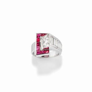 A platinum, diamond and ruby no heat ring, circa 1940, with certificate