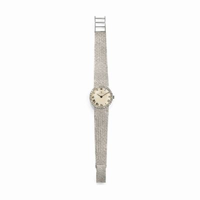 Orologio in oro bianco 18k con quadrante chiaro e diamanti