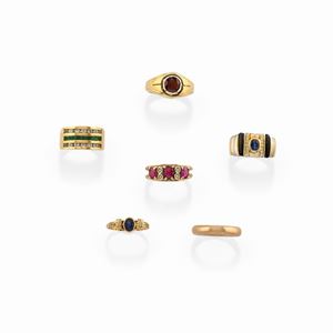 Six 18k two-color gold, diamond, ruby, sapphire, garnet, mother-of-pearl, onyx, green and colorless gemstone rings