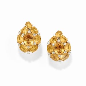 A 18k two-color gold and citrine quartz earclips