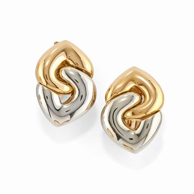 Orecchini a doppio cuore in oro bicolore 18k