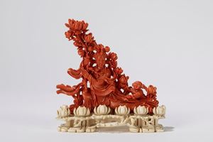 ☼A coral carving on ivory base. China, early 20th c.