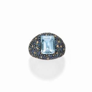 A 18k yellow gold, silver, aquamarine, sapphire and diamond ring