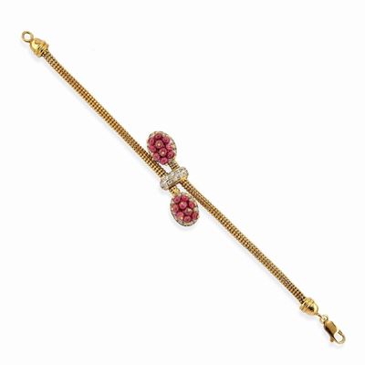 Bracciale in oro bicolore 18k con rubini e diamanti