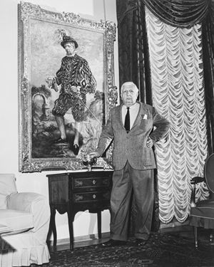 Giorgio De Chirico under one of his self-portraits