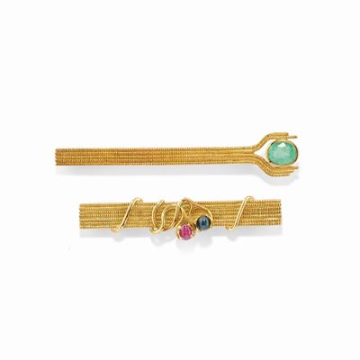 Due spille in oro giallo 18k con rubini e zaffiri
