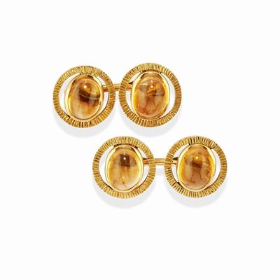 Coppia di polsini in oro giallo 18k con quarzi cabochon