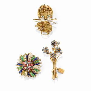 Three 18k two-color gold, sapphire, emerald, ruby and diamond brooches