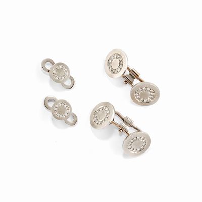 Set da sparato, in oro bianco 18k con diamanti taglio huit-huit