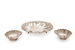 A silver centerpiece and two silver bowls, Italy 20th Century