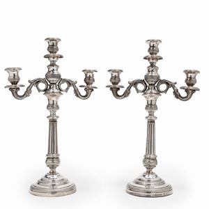 A pair of silver candelabra, Genoa early 19th Century, defects
