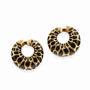 A 18k yellow gold and black metal earclips, Marina B.