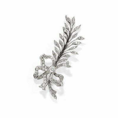 Spilla con motivo a fiocco, diamanti taglio brillante, oro bianco 18k