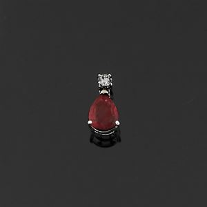 A 18K white gold, ruby and diamond pendant