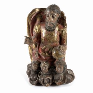 Antica scultura in legno policromo raffigurante Cristo in gloria con cherubini