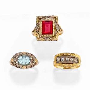 Three 18k yellow gold, silver, color and colorless stone rings