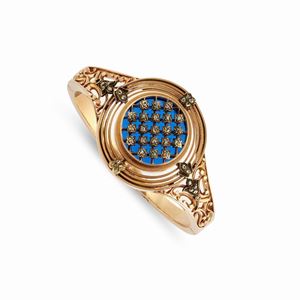 A 18k yellow gold, silver, diamond and glass paste bangle