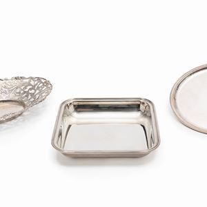 Two silver plates and a silver basket, 20th Century