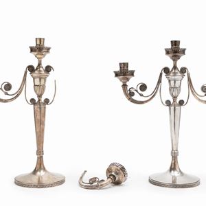 A couple of silver candelbra, Italy 20th Century, defects