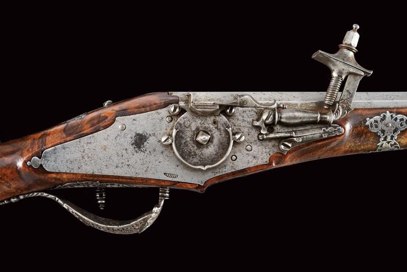 Elegante Pistola a Ruota