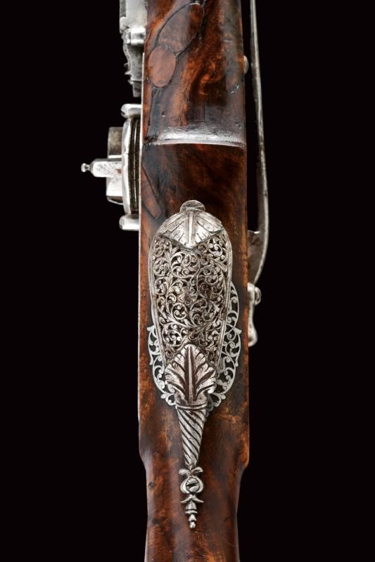 Elegante Pistola a Ruota