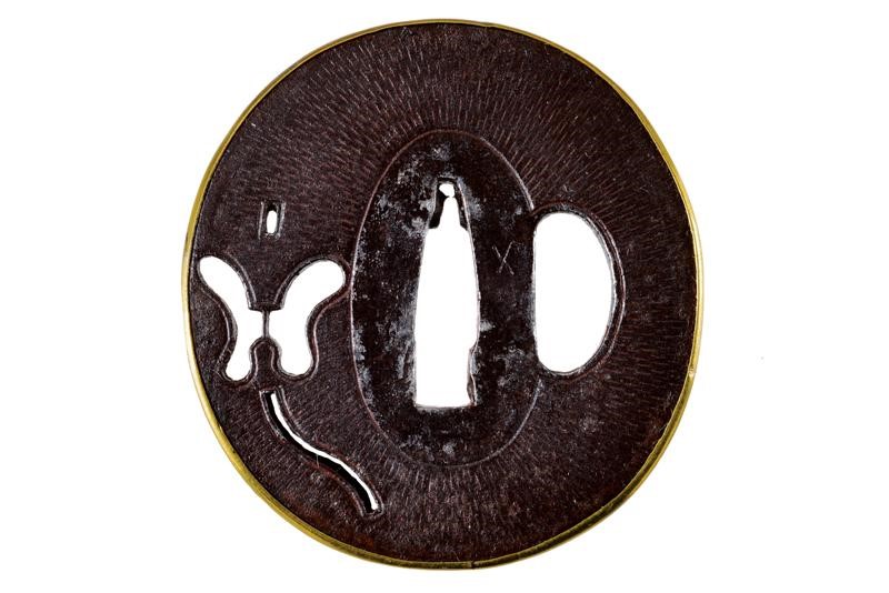 Elegante Tsuba della Scuola Umetada
