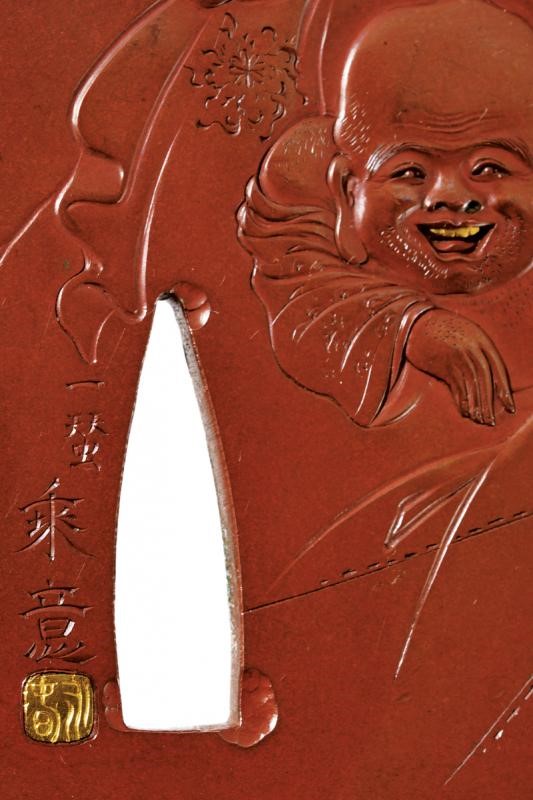 Importante Tsuba Firmata Issan Joi con Kao