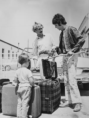 Paul Mcartny, Julian Lennon, John Lennon's son and their host, Greece