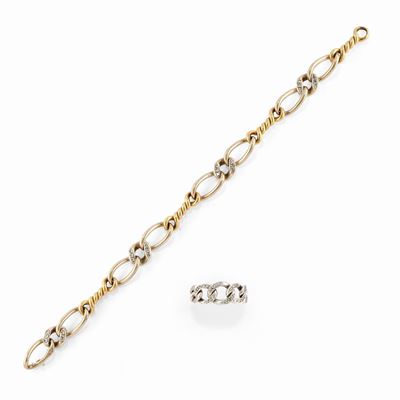 Lotto di gioielli in oro bicolore 18k comprendente bracciale Pomellato e anello a maglia groumett...