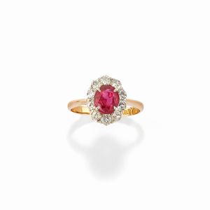 A 18k two-color gold, (ruby no heat) and diamond ring, with certificate