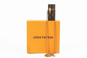 Monogram canvas and metal gilt with chain lipstick case