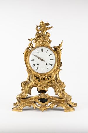 A Louis XV style gilt bronze mantel clock, France 19th c