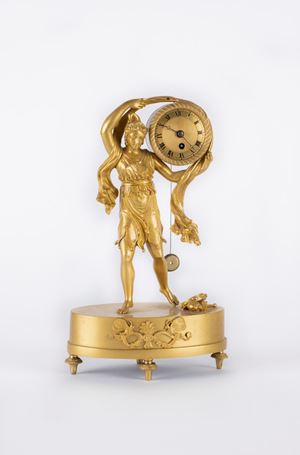  - Orologio da appoggio francese in bronzo dorato al mercurio. Epoca Impero. 