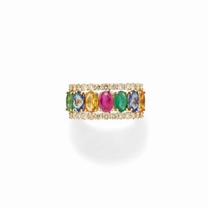 A 18k yellow gold, sapphire, emerald, ruby and diamond ring