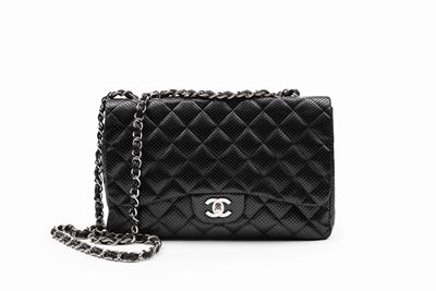 Borsa in pelle matelassé traforata nera con tracolla a catena, 2006