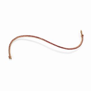 A 18k red gold and pink sapphire bracelet