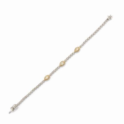 Bracciale in oro bicolore 18k con diamanti taglio navette e brillante