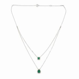 A 18k white gold, emerald and diamond necklace, with certificate